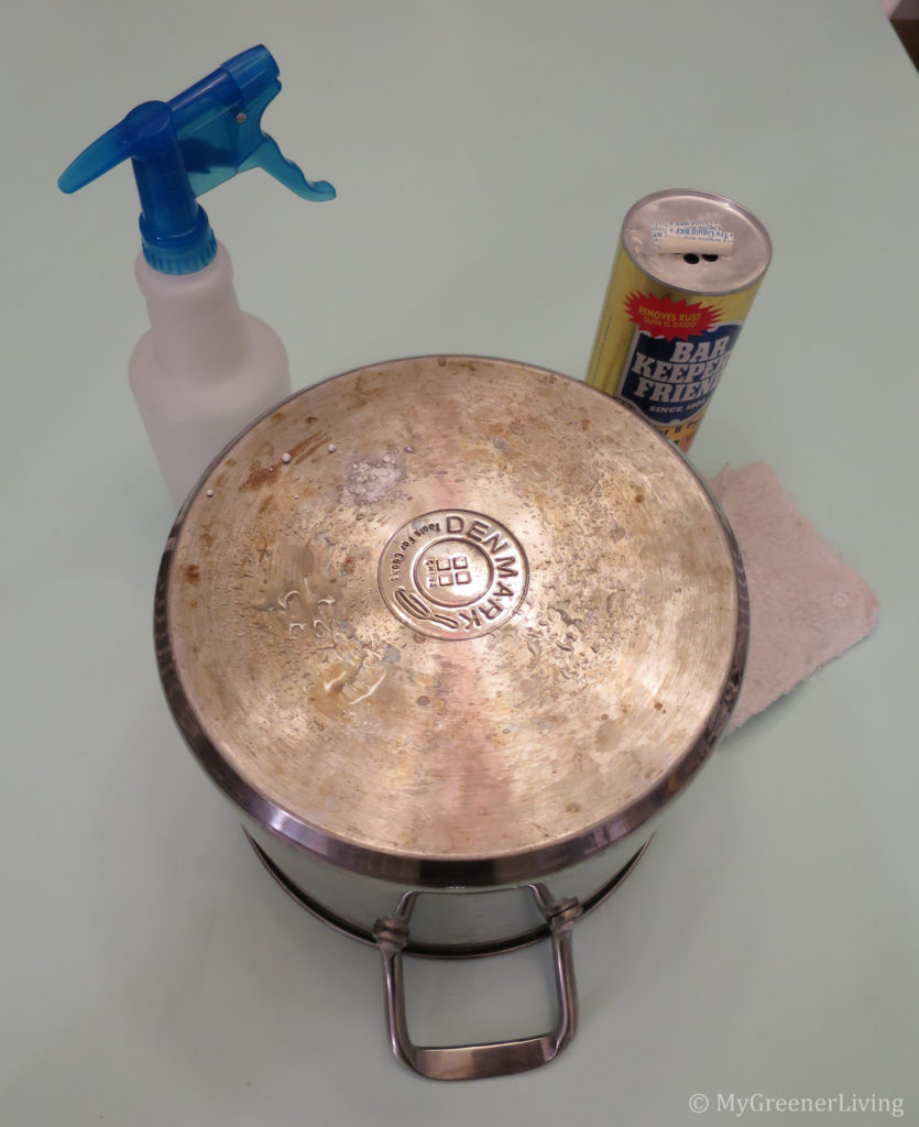 Bar Keeper's Friend with aluminum pot,cloth, and spray bottle