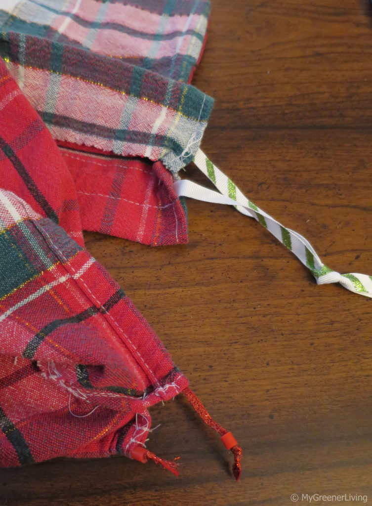 tops of two different drawstring reusable bags