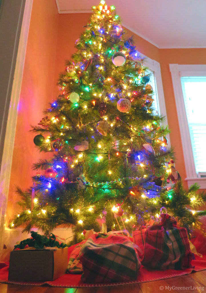christmas tree with gifts wrapped in fabric reusable gift bags with reusable chalk tags