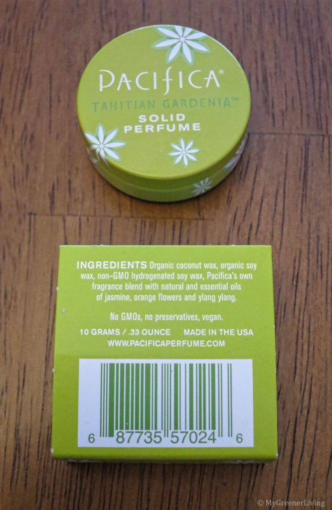 Pacifica solid perfume with box showing ingredient list: organic cocnut wax, organic soy wax, non-GMO hydrogenated soy wax, Pacifica's own fragrance blend with natural and essential oils of jasmine, Orange flowers and ylang ylang.