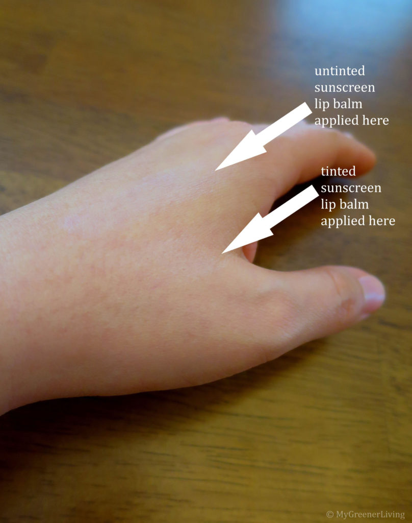 photo of Diana's hand with sunscreen lip balm not rubbed in